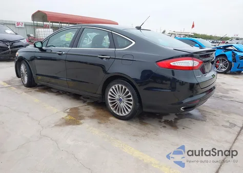 2014 Ford Fusion Titanium z USA, uszkodzony, nr VIN 3FA6P0K9XER320313